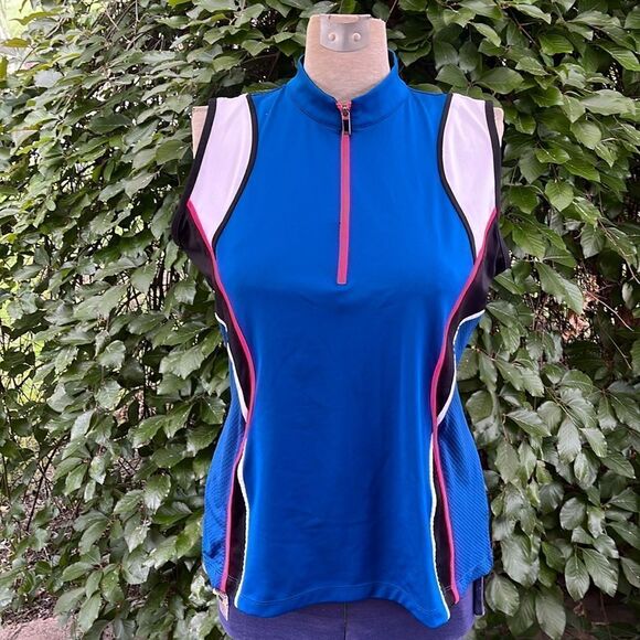 EXCELLENT CONDITION WOMEN’S LARGE TAIL SLEEVELESS 1/4 ZIP GOLF TOP - Picture 1 of 6
